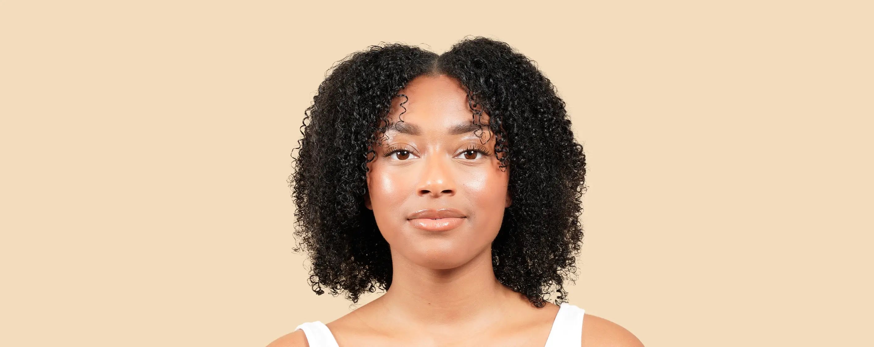 photo cheveux frisés après d'un modèle