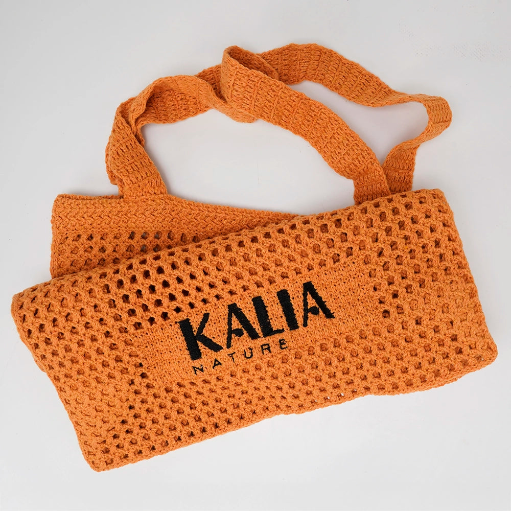 Sac Summer Toto Bag orange Kalia Nature, en crochet, léger et élégant pour accompagner toutes tes journées d’été.