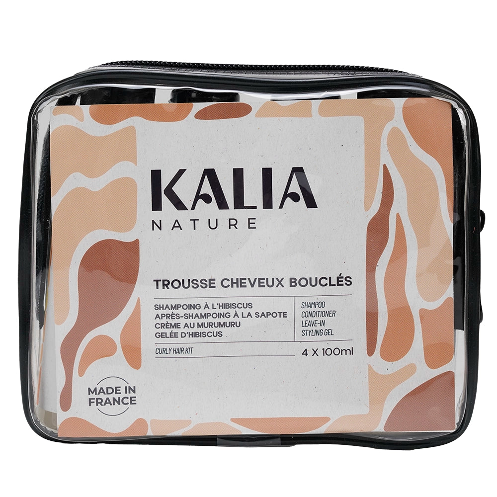 Ensemble de soins capillaires Kalia Nature en format voyage pour cheveux bouclés dans une trousse. 