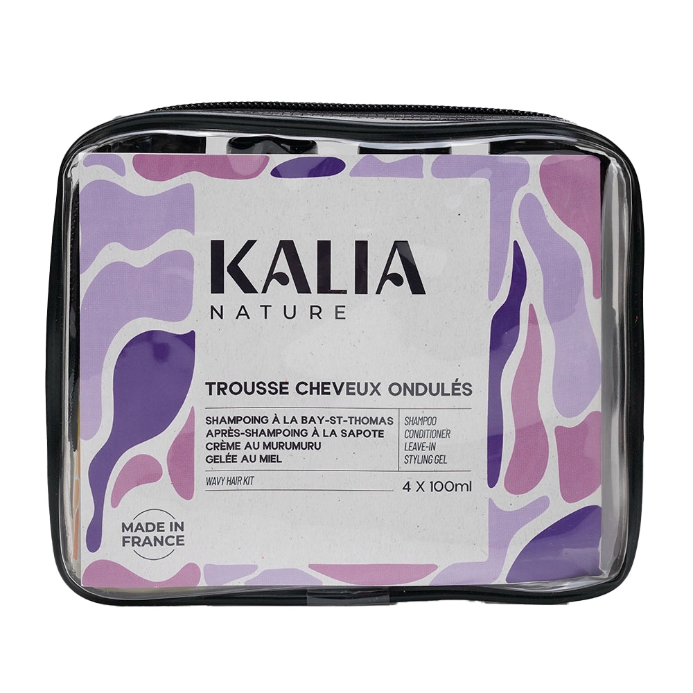 Ensemble de soins capillaires Kalia Nature en format voyage pour cheveux ondulés dans une trousse.